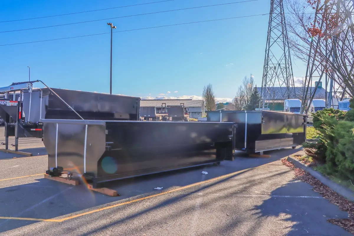 Roll-off dumpster ready for waste disposal at job site for 15 Yard Dumpster Rental in Unity